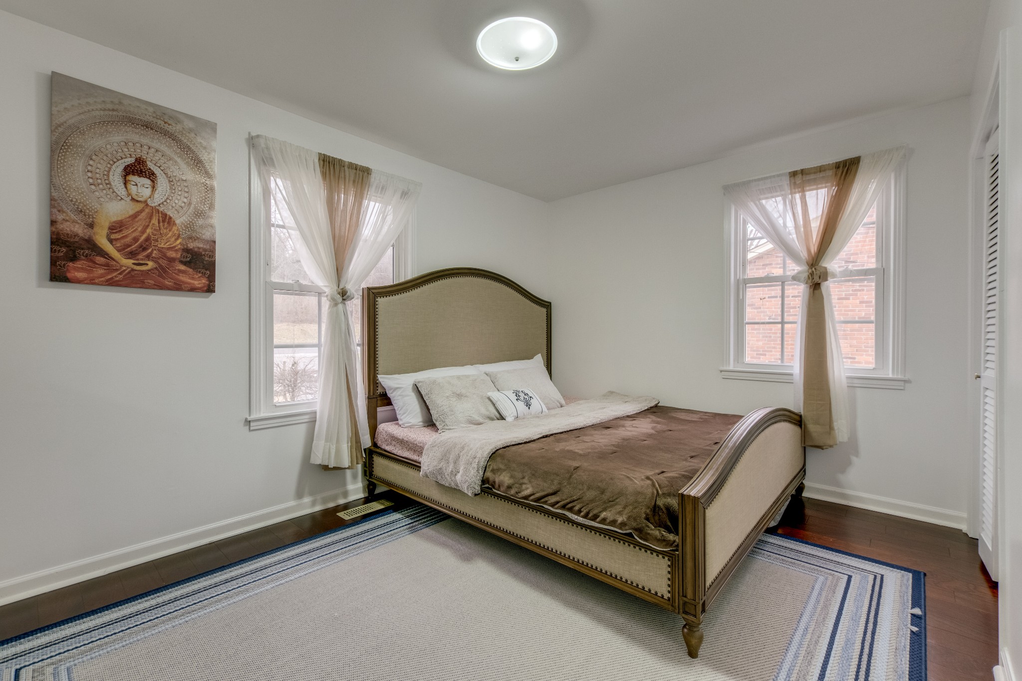 68 Tusculum Road Antioch, TN 37013 - Photo 15 of 25 a bedroom with a bed and a window