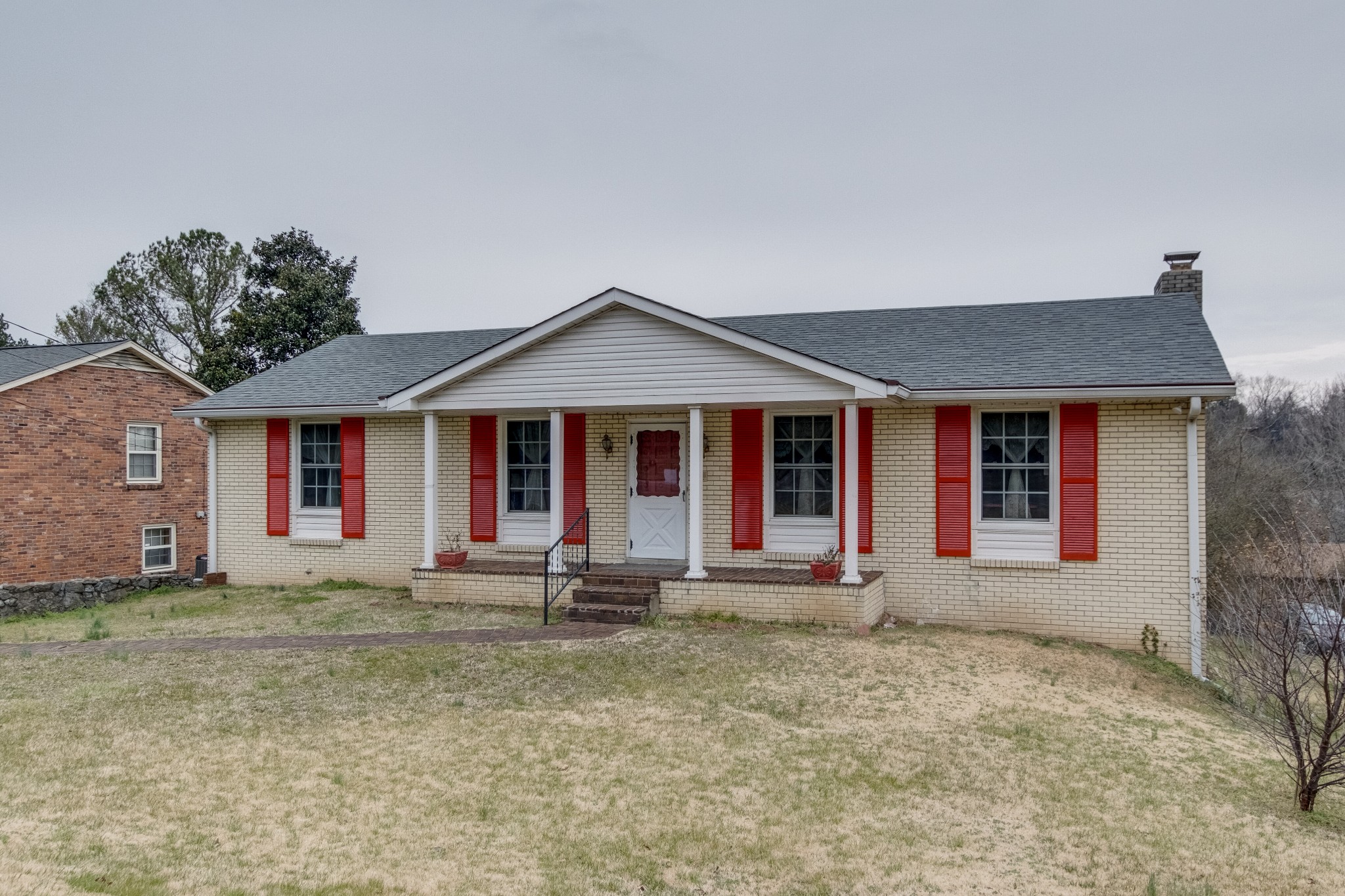 68 Tusculum Road Antioch, TN 37013 - Photo 3 of 25 front view of a house with a yard