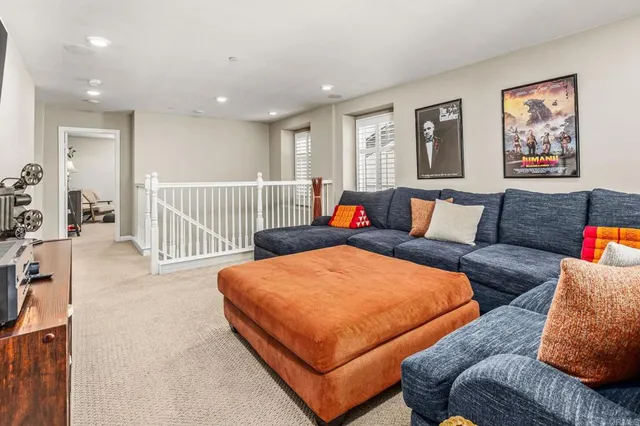 a bedroom with furniture and a couch