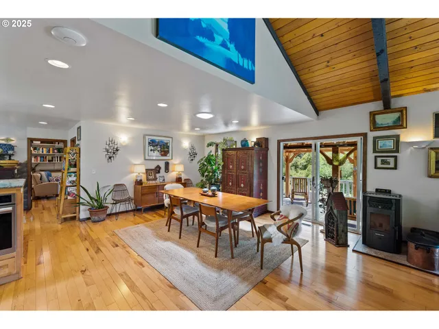 a kitchen with stainless steel appliances granite countertop a stove and a refrigerator