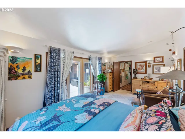 a bathroom with a sink a mirror and a shower