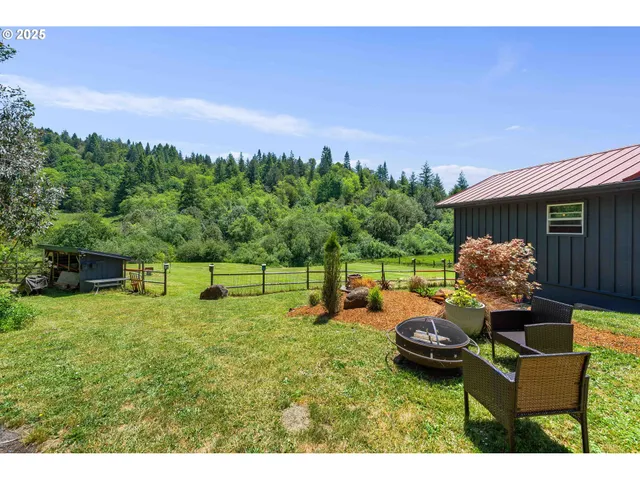 a backyard of a house with lots of green space