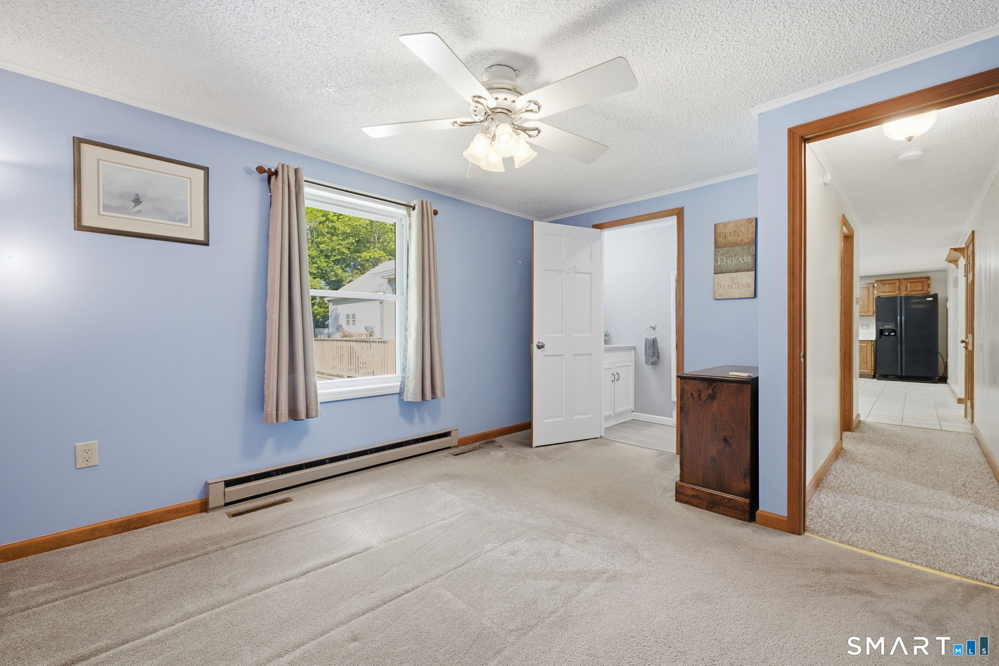 141 Hop River Road Coventry, CT 06238 - Photo 14 of 40 wooden floor in an empty room with a window