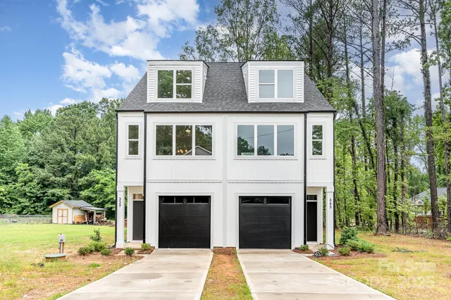 a view of a brick house with a large windows