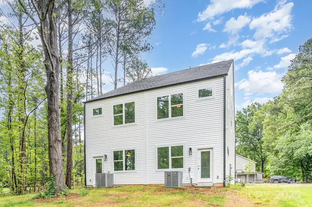 a view of a house with a swimming pool