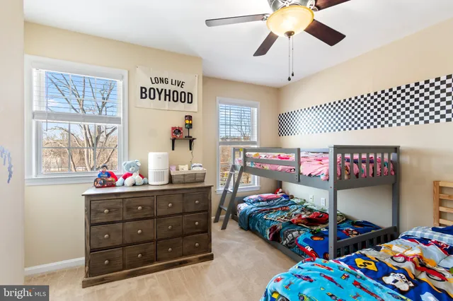 a bathroom with a sink toilet tub and shower