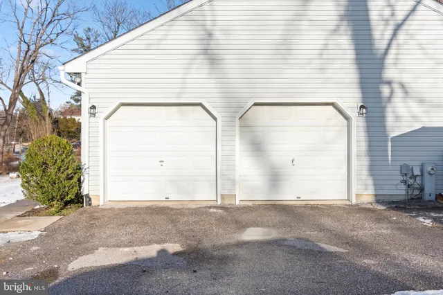 a view of a house with a street