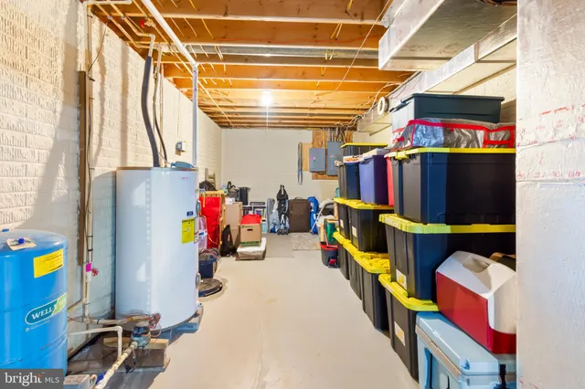a view of a balcony with chairs and wooden floor
