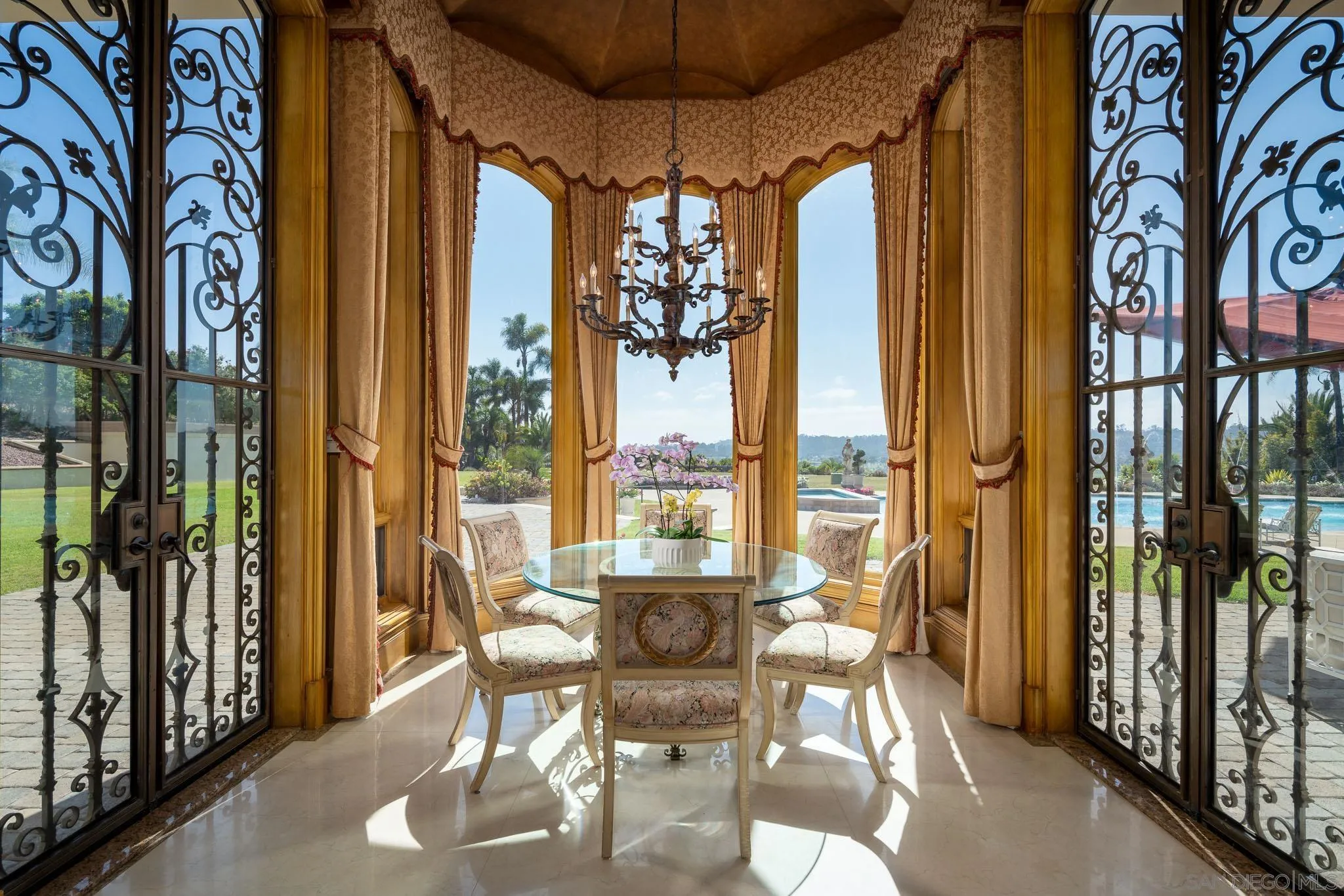 6883 Alydar Corte Del Mar, CA 92014 - Photo 17 of 48 a dining room with large windows