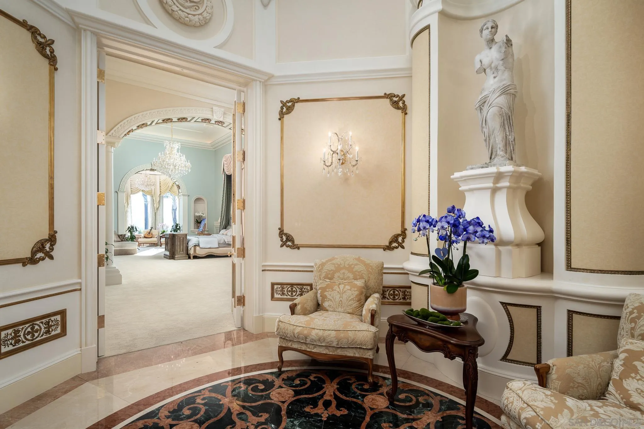 6883 Alydar Corte Del Mar, CA 92014 - Photo 28 of 48 a living room with furniture and flowers