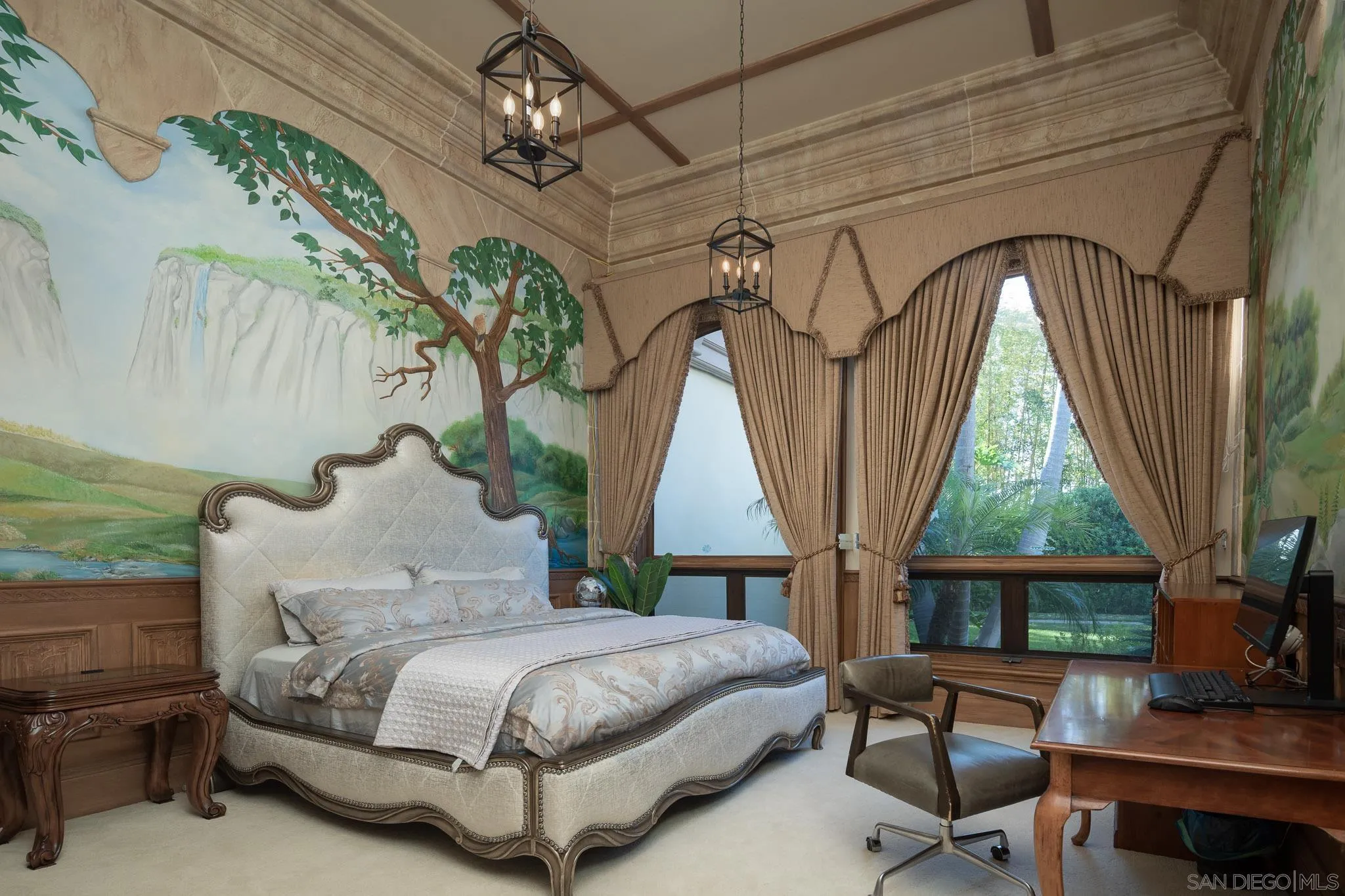 6883 Alydar Corte Del Mar, CA 92014 - Photo 35 of 48 a spacious bedroom with a bed a chandelier and a large window