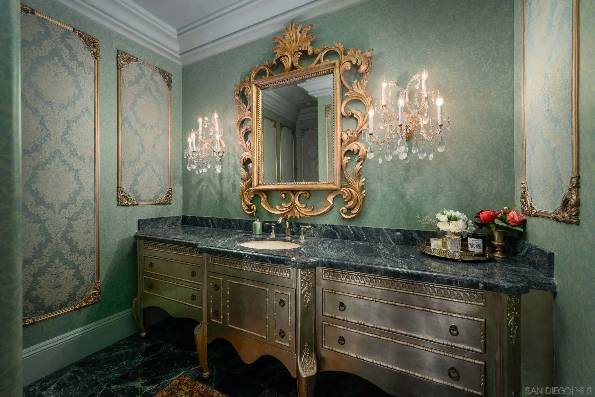 6883 Alydar Corte Del Mar, CA 92014 - Photo 36 of 48 a bathroom with a granite countertop sink a mirror and shower