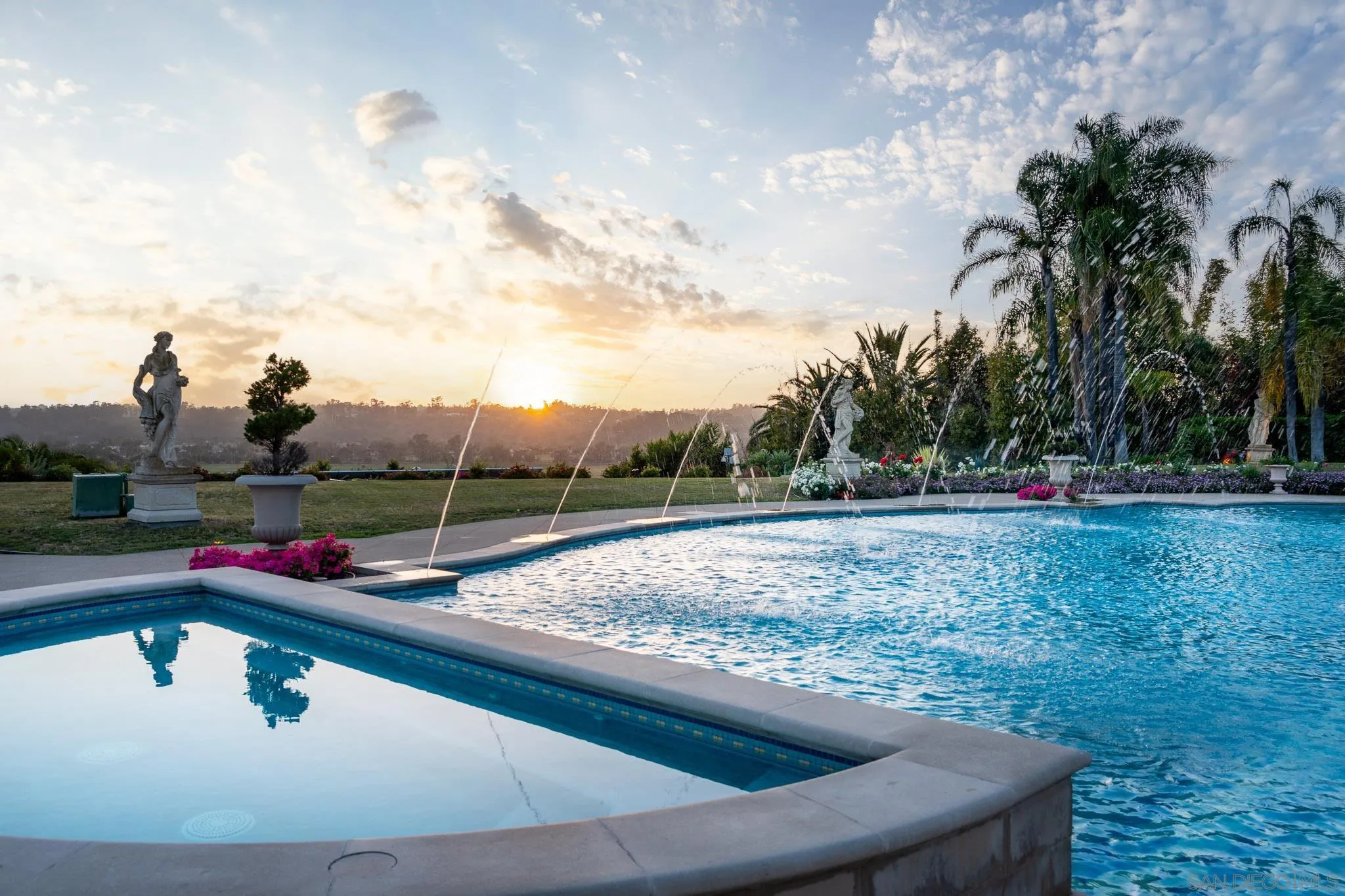 6883 Alydar Corte Del Mar, CA 92014 - Photo 37 of 48 a view of a swimming pool with a yard and sitting space