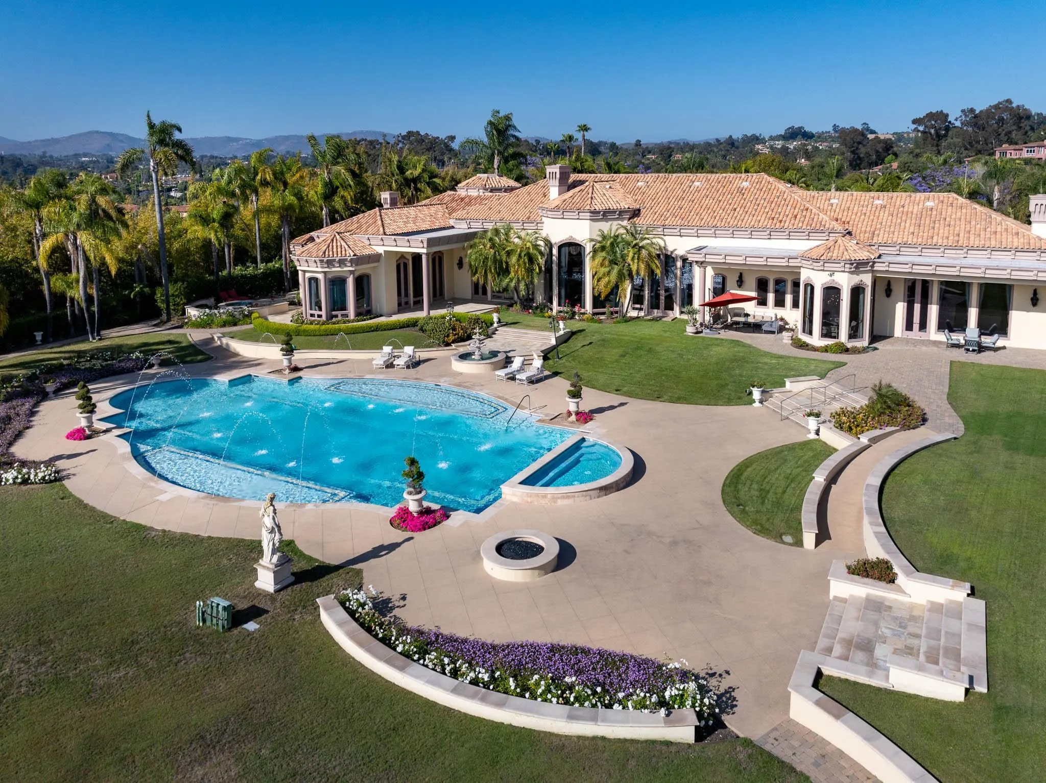6883 Alydar Corte Del Mar, CA 92014 - Photo 40 of 48 an aerial view of a house with swimming pool garden and patio