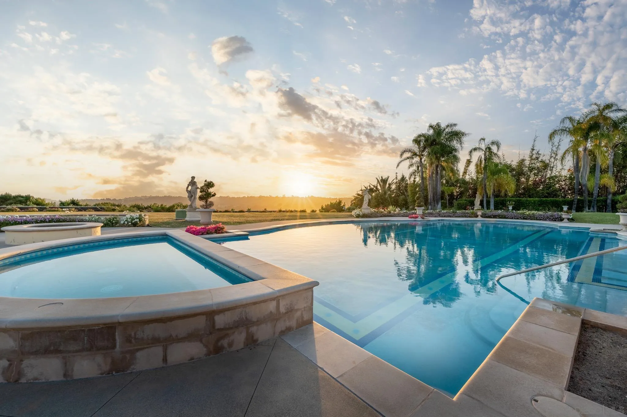 6883 Alydar Corte Del Mar, CA 92014 - Photo 6 of 48 a swimming pool with outdoor seating and lake