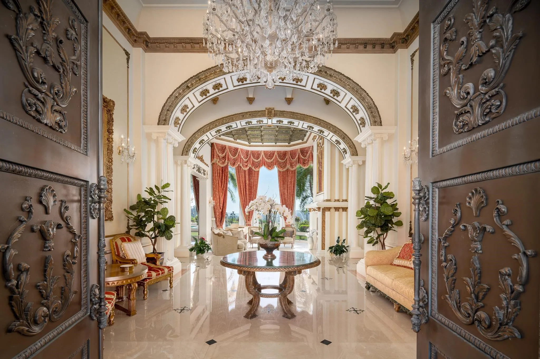 6883 Alydar Corte Del Mar, CA 92014 - Photo 8 of 48 a view of a entryway with furniture and chandelier