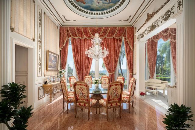 a view of a dining room with furniture window and outside view