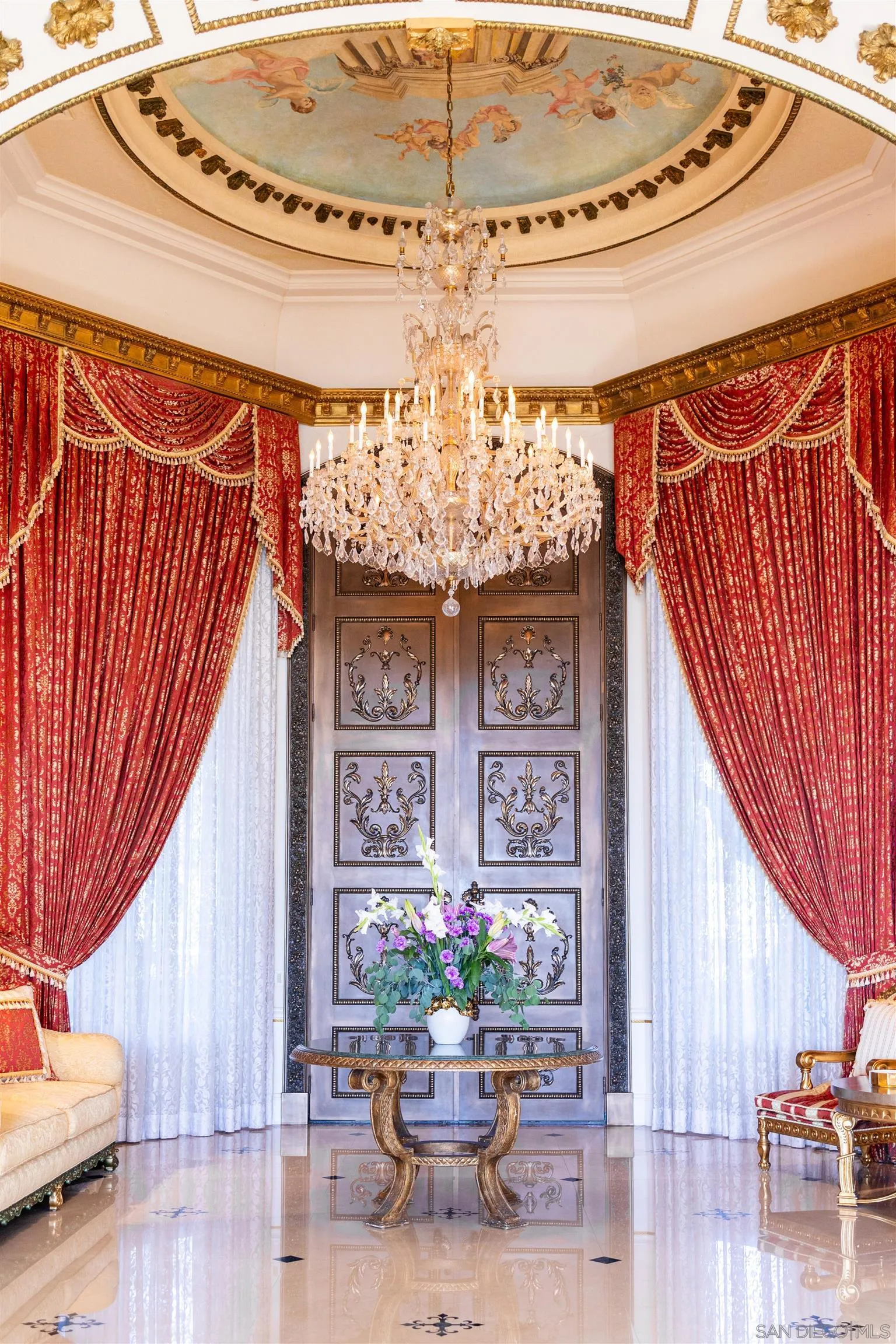 6883 Alydar Corte Del Mar, CA 92014 - Photo 10 of 48 a dining room with furniture and a chandelier