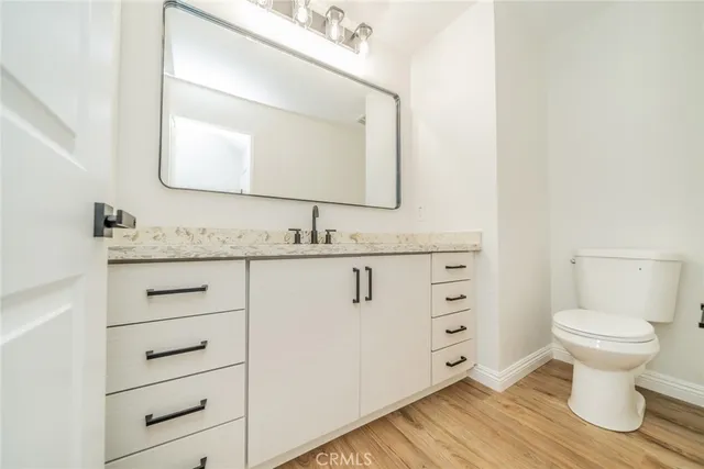 a bathroom with a toilet and a bathtub