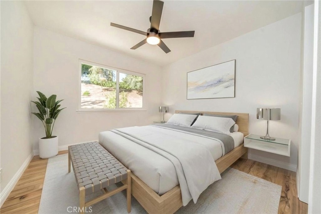 3 Wild W Circle Phillips Ranch, CA 91766 - Photo 39 of 65 a bedroom with a bed and a window