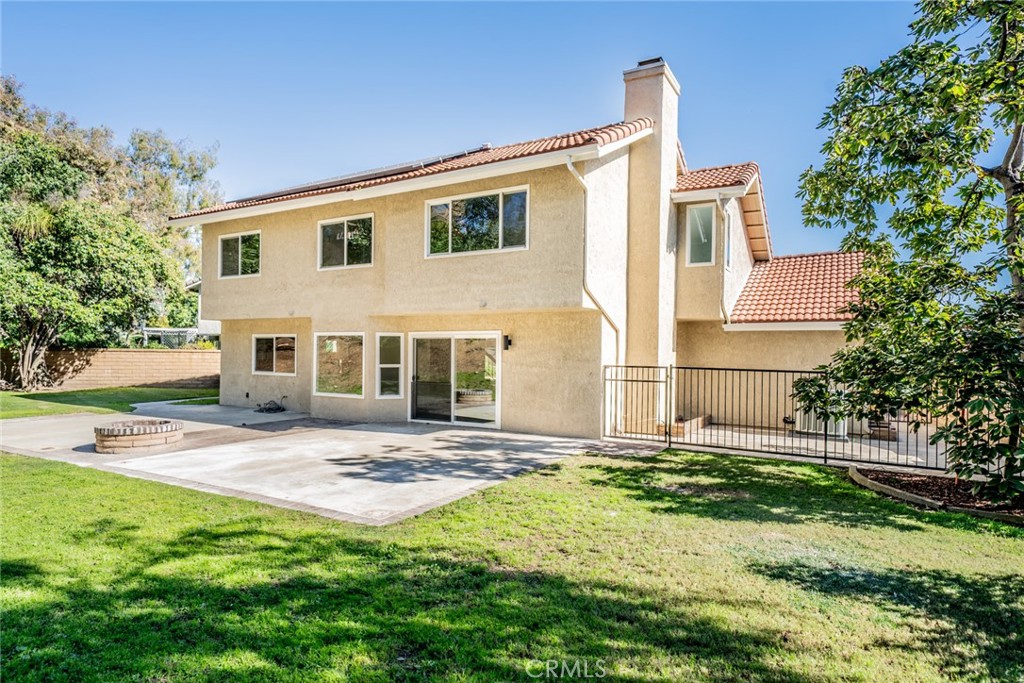3 Wild W Circle Phillips Ranch, CA 91766 - Photo 48 of 65 a view of a house with backyard and a tree