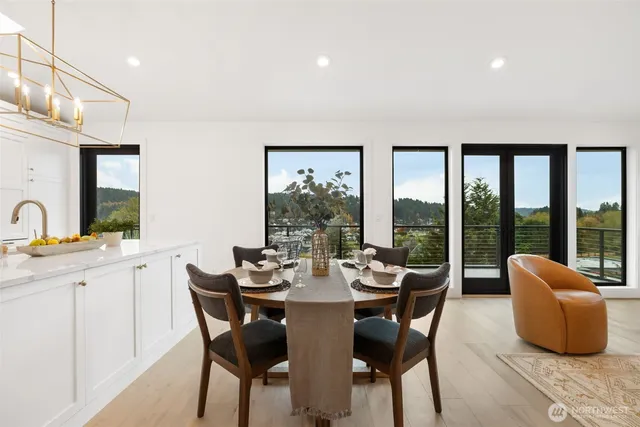 a view of a dining room with furniture window and outside view
