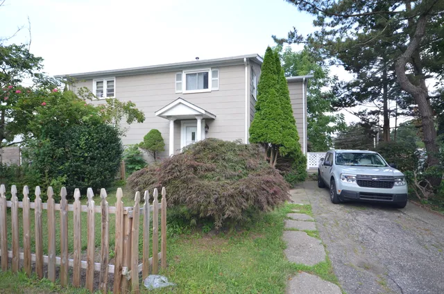 a house view with a garden space