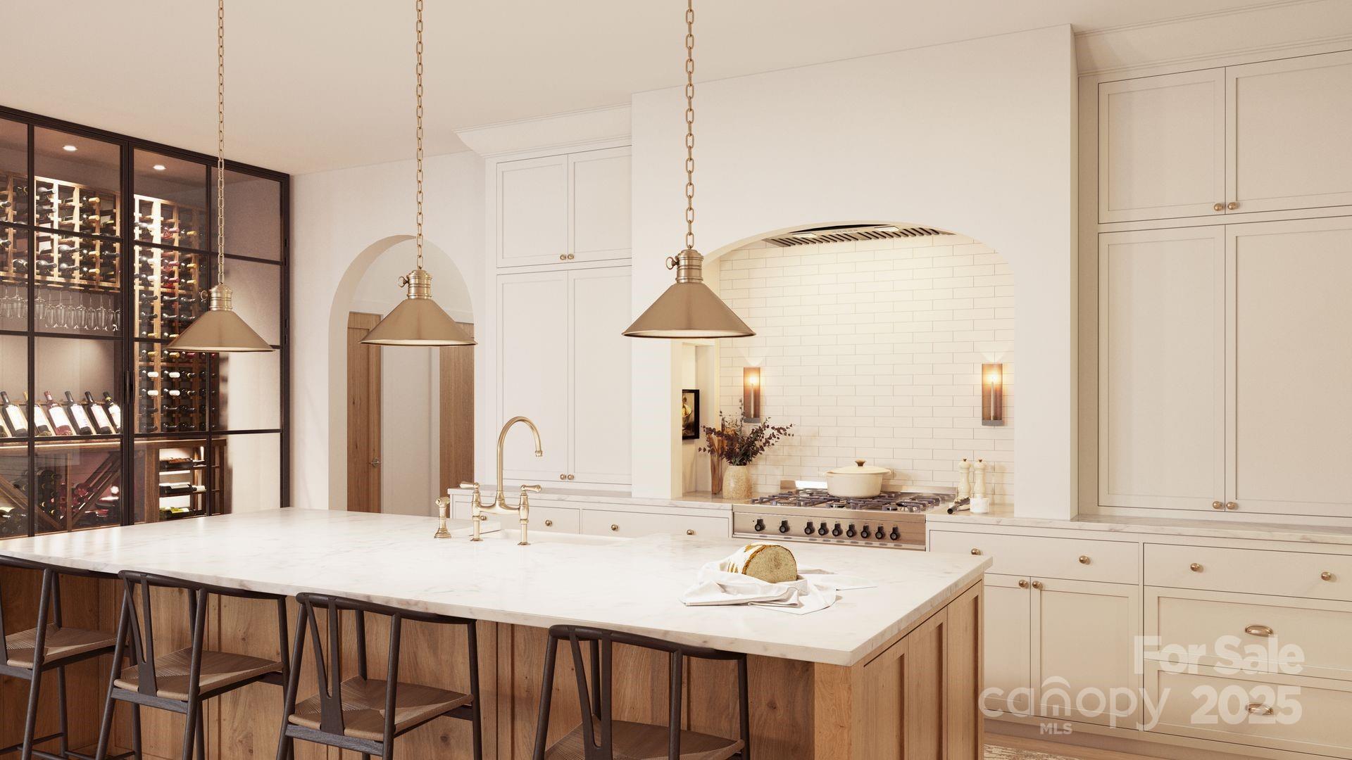 2109 Inlt Shr Road Northeast Connelly Springs, NC 28612 - Photo 11 of 34 a kitchen with kitchen island granite countertop a sink and white cabinets