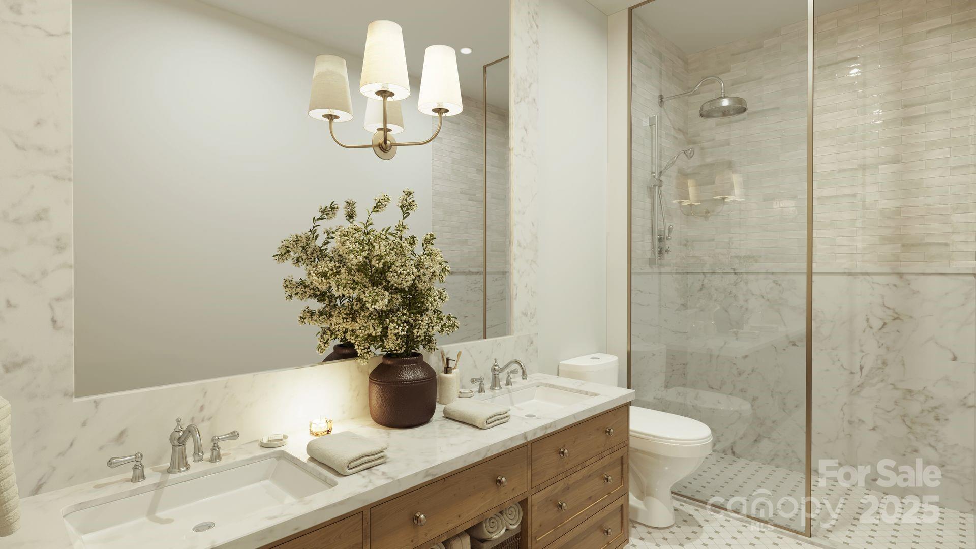 2109 Inlt Shr Road Northeast Connelly Springs, NC 28612 - Photo 15 of 34 a bathroom with a granite countertop sink a toilet and shower