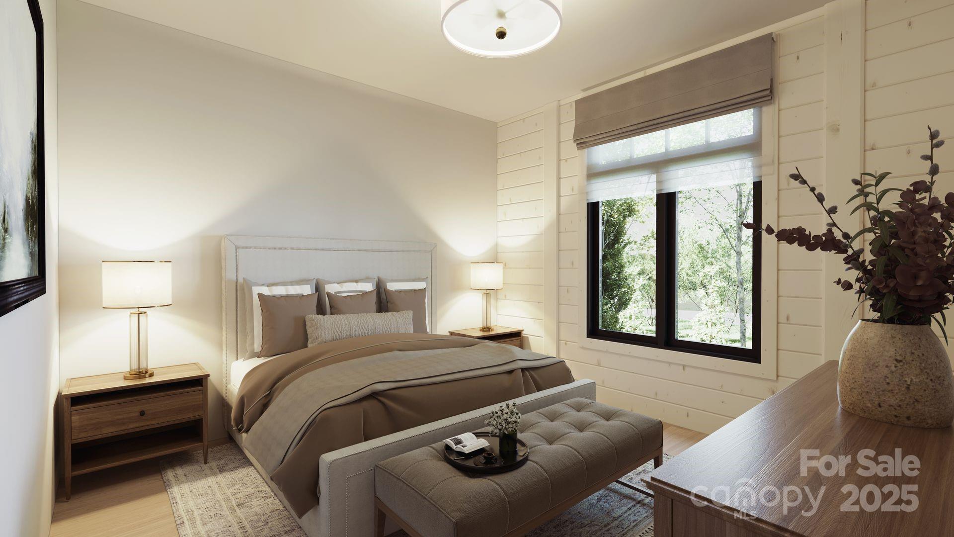 2109 Inlt Shr Road Northeast Connelly Springs, NC 28612 - Photo 23 of 34 a bedroom with a bed and a couch