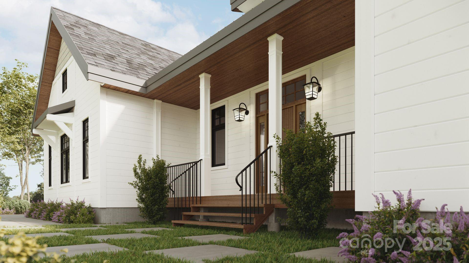 2109 Inlt Shr Road Northeast Connelly Springs, NC 28612 - Photo 3 of 34 a front view of a house with garden