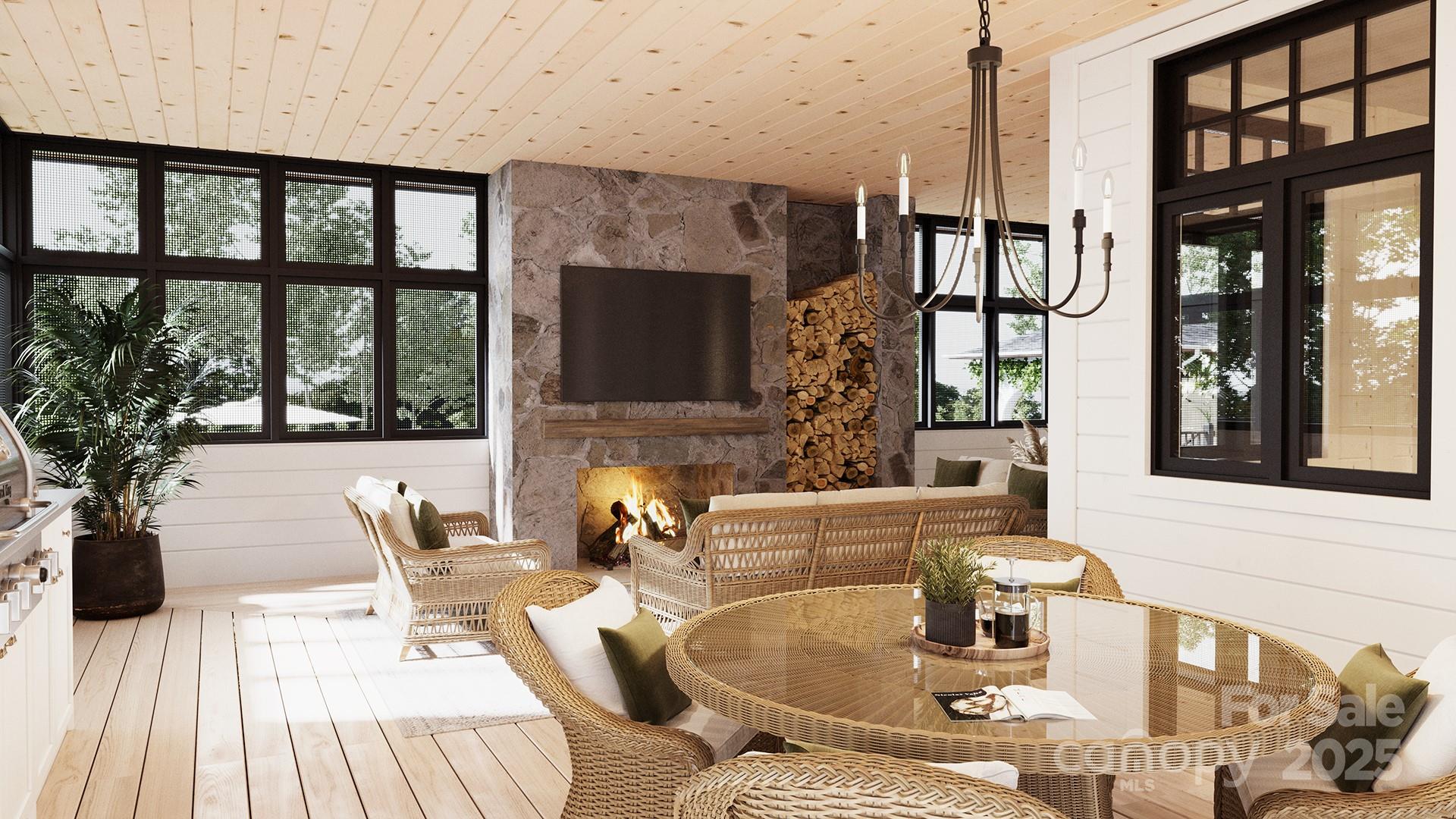 2109 Inlt Shr Road Northeast Connelly Springs, NC 28612 - Photo 5 of 34 a living room with furniture large window and flat screen tv