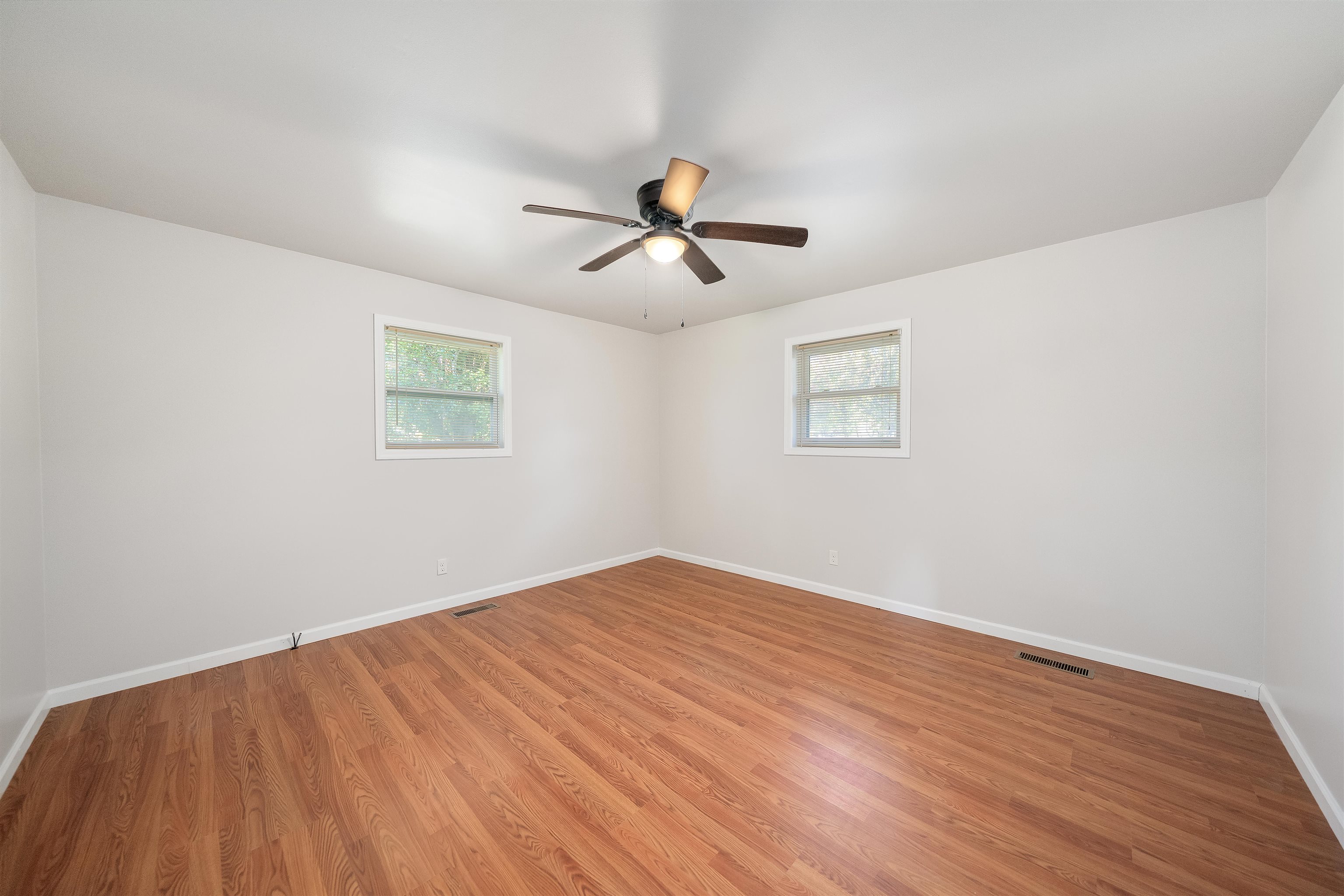 1070 Pine Top Road Toone, TN 38381 - Photo 14 of 30 a view of empty room with wooden floor