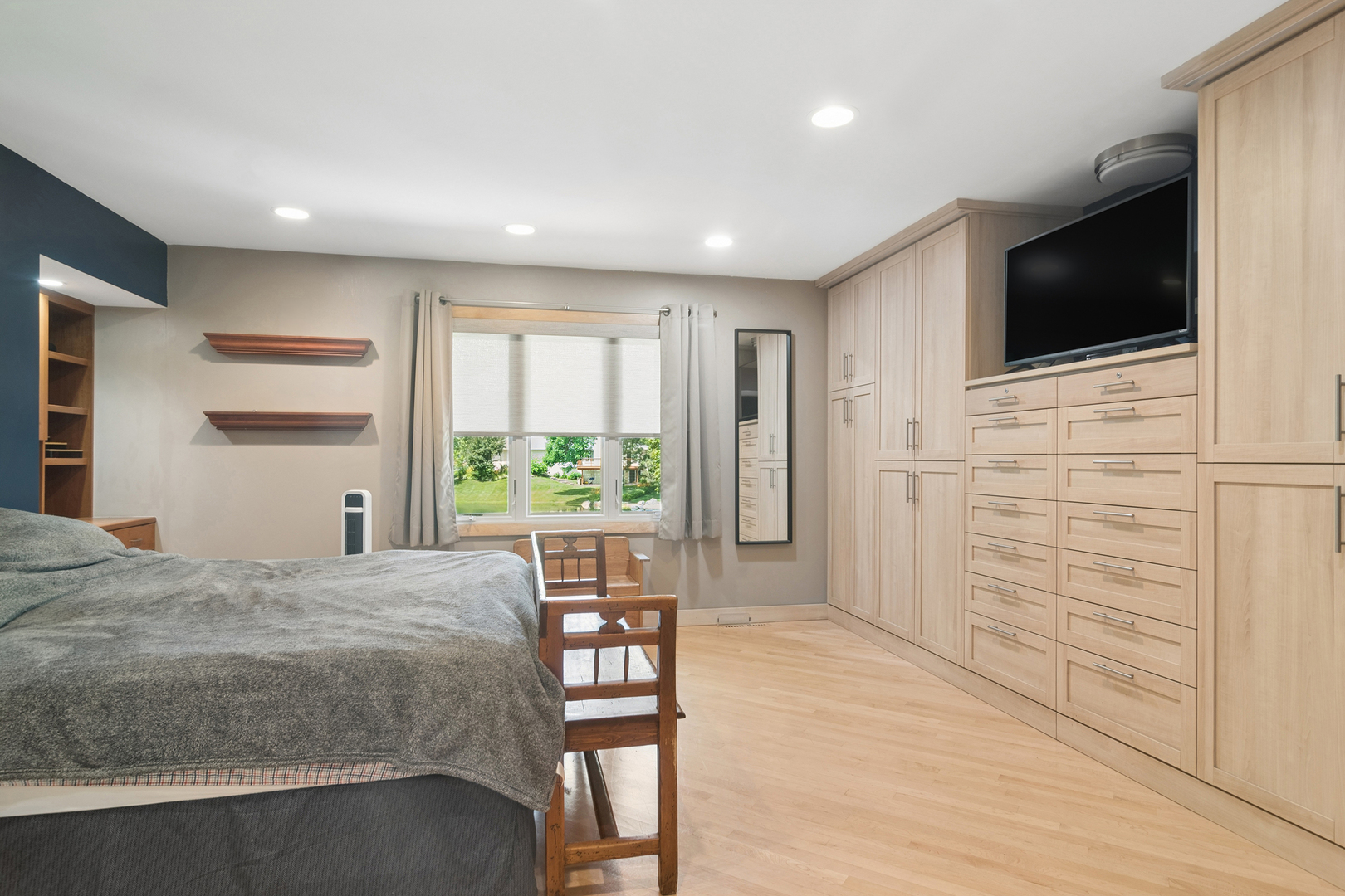 170 South Ela Road Barrington, IL 60010 - Photo 15 of 33 a spacious bedroom with a bed and a flat screen tv