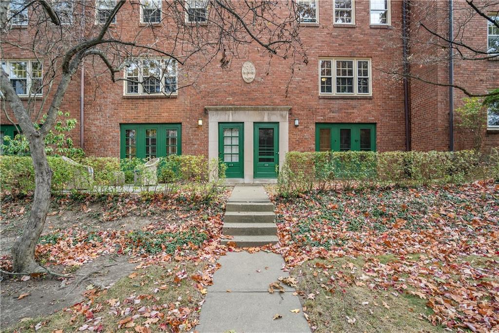 420 Sulgrave Road Pittsburgh, PA 15211 - Photo 1 of 35 front view of a brick house with a large windows