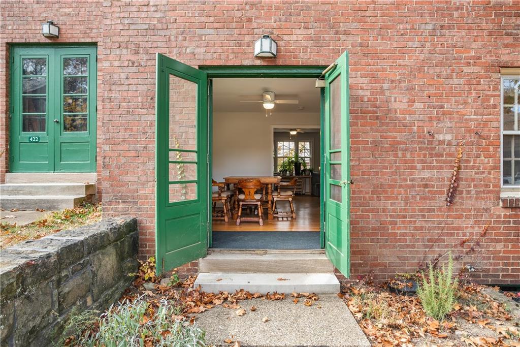 420 Sulgrave Road Pittsburgh, PA 15211 - Photo 23 of 35 a front view of a house with a garden