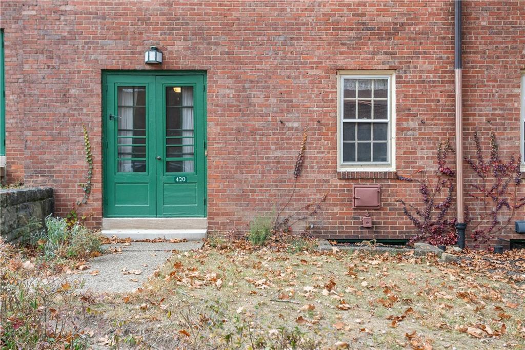 420 Sulgrave Road Pittsburgh, PA 15211 - Photo 26 of 35 a front view of a house with a garden