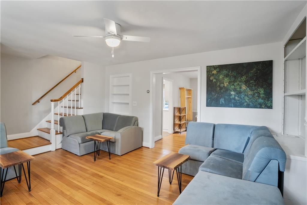 420 Sulgrave Road Pittsburgh, PA 15211 - Photo 3 of 35 a living room with furniture and a large window
