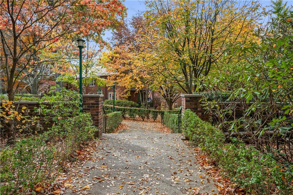 420 Sulgrave Road Pittsburgh, PA 15211 - Photo 35 of 35 a backyard of a house with lots of green space and fountain