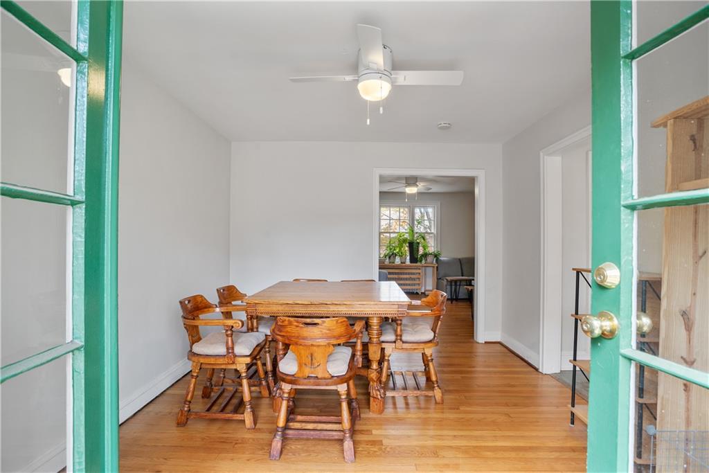 420 Sulgrave Road Pittsburgh, PA 15211 - Photo 10 of 35 a view of a dining room with furniture and wooden floor