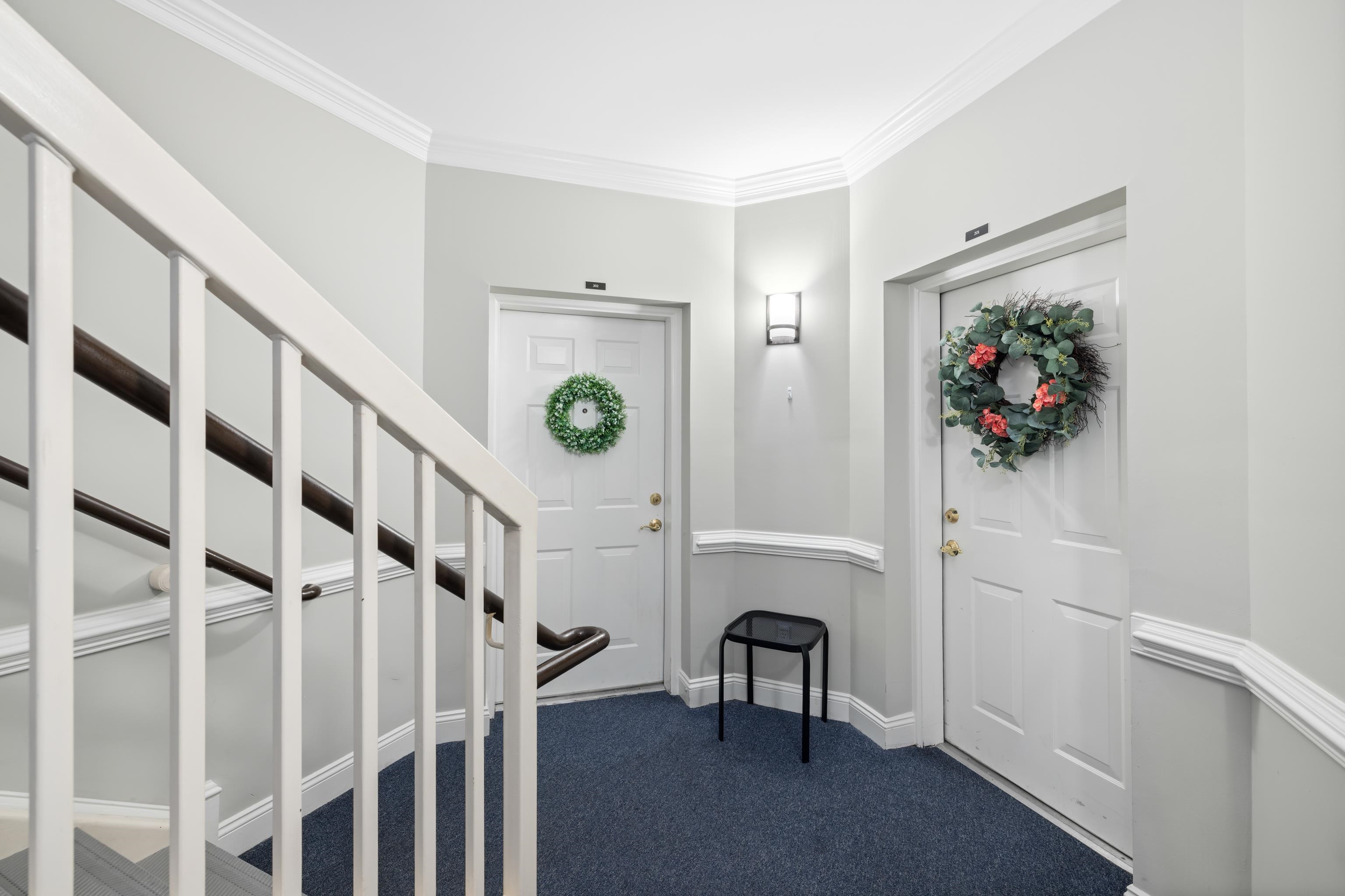 1410 North Coalter Street, Unit 202 Staunton, VA 24401 - Photo 5 of 52 a view of entryway with workspace and stairs
