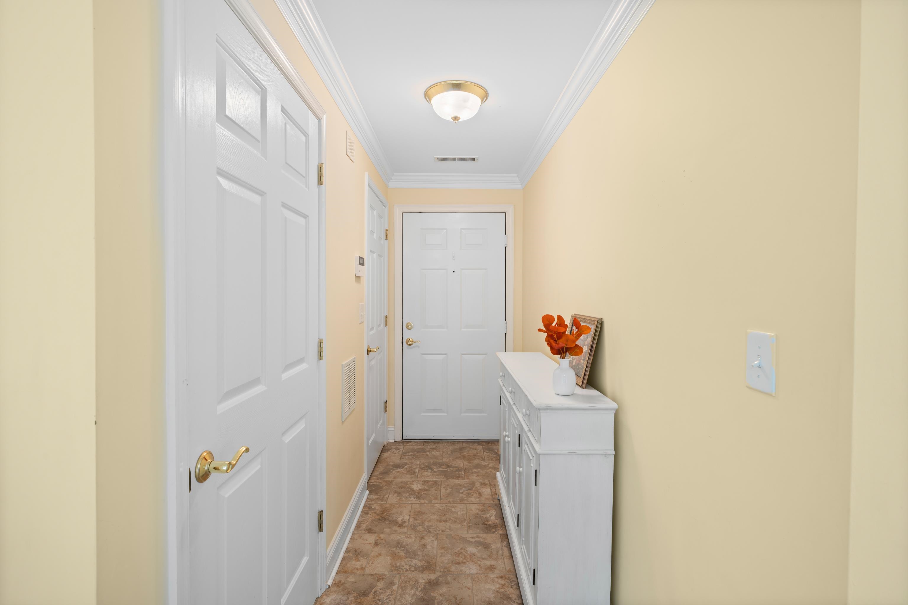 1410 North Coalter Street, Unit 202 Staunton, VA 24401 - Photo 6 of 52 a room that has a rug and a table