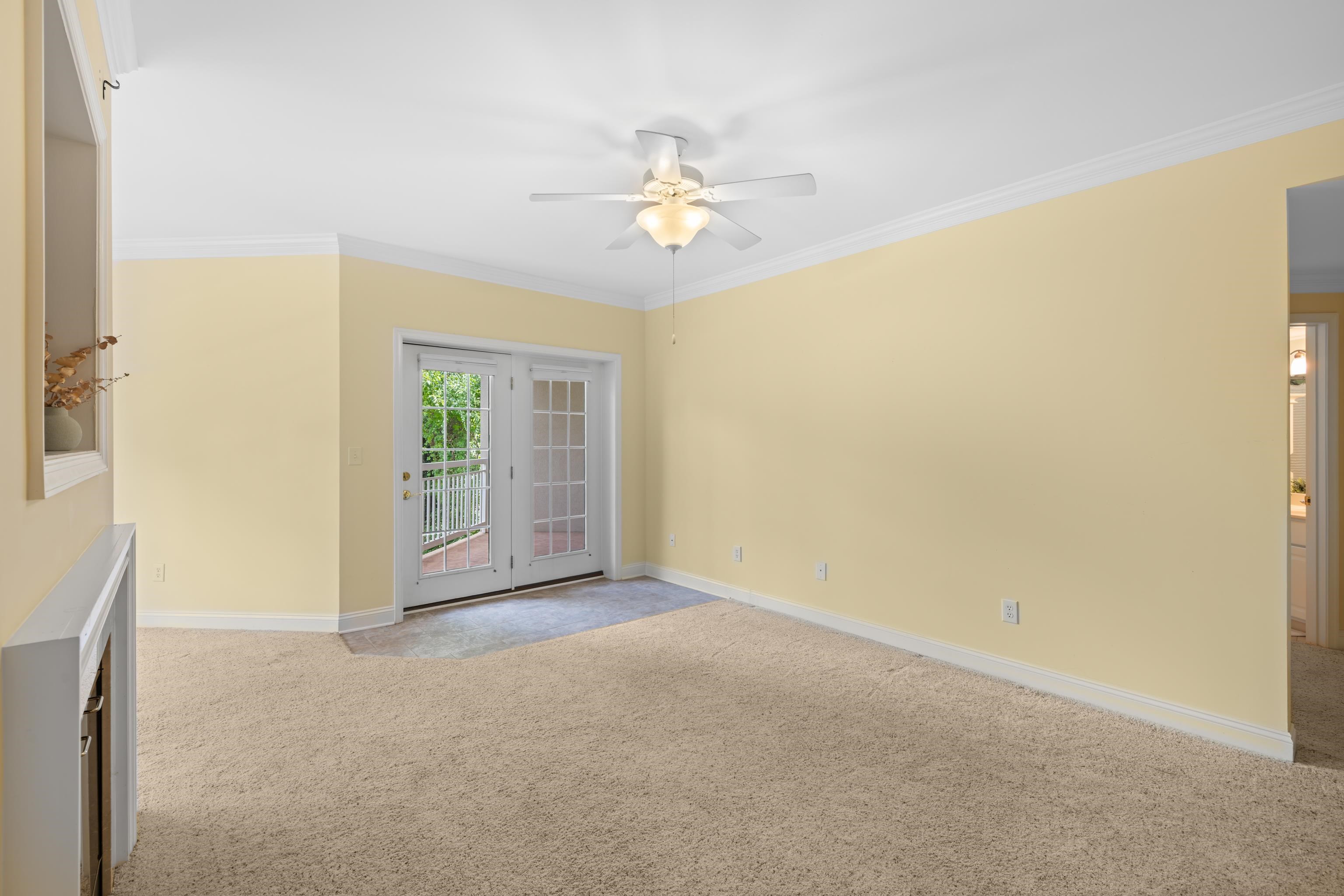 1410 North Coalter Street, Unit 202 Staunton, VA 24401 - Photo 8 of 52 an empty room with closet and a chandelier fan