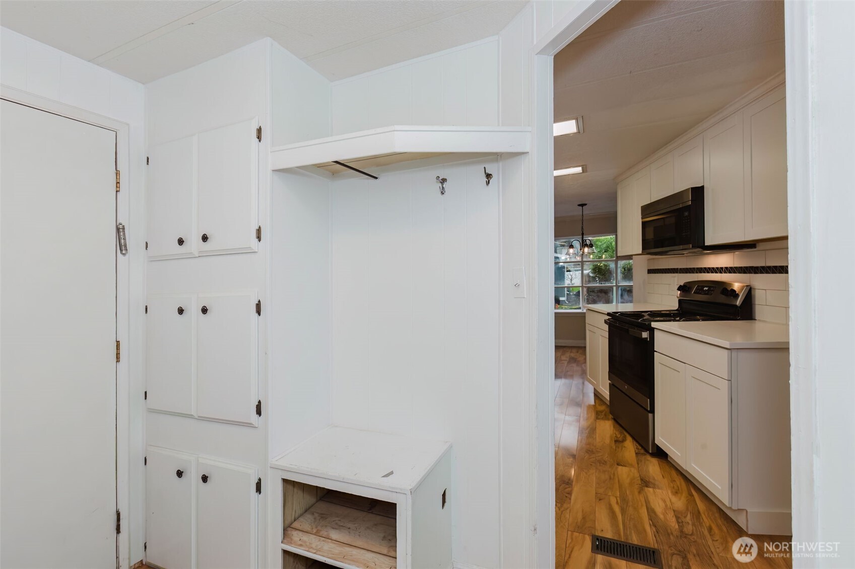 2535 70th Avenue Southwest, Unit 12 Tumwater, WA 98512 - Photo 14 of 33 a kitchen with cabinets and a stove top oven