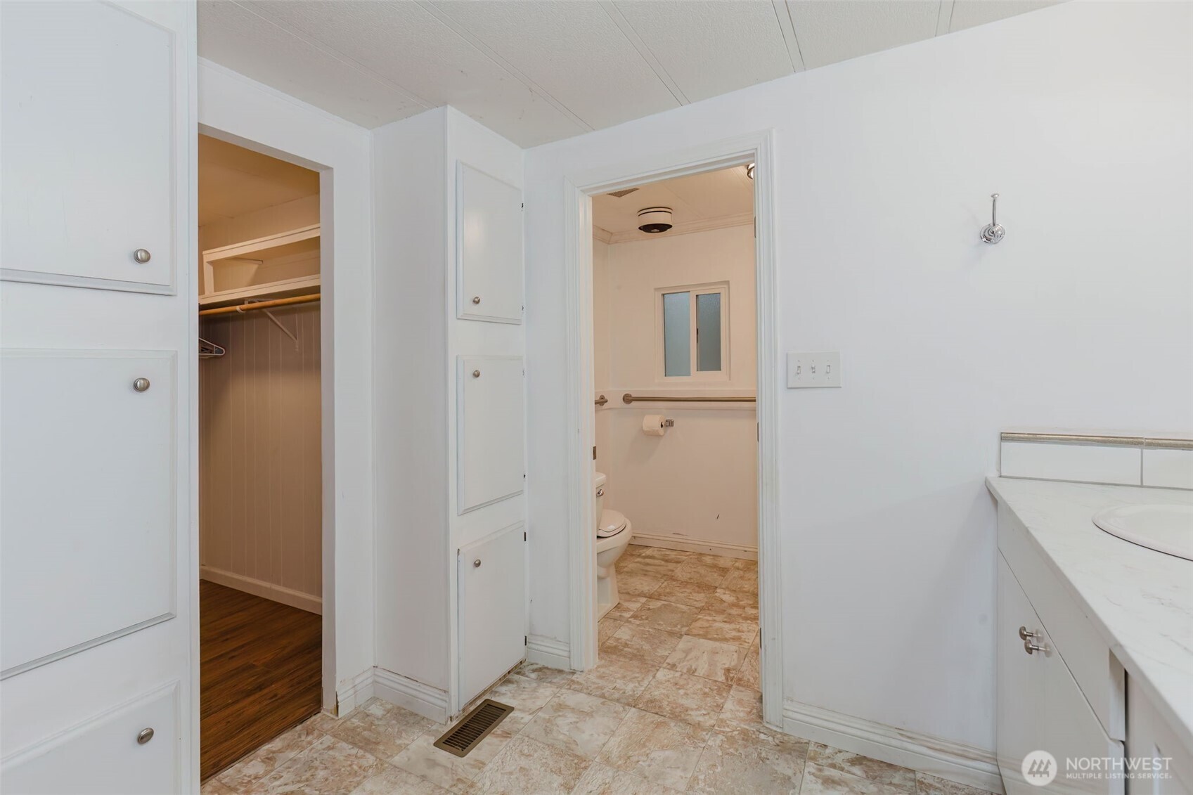 2535 70th Avenue Southwest, Unit 12 Tumwater, WA 98512 - Photo 15 of 33 a view of a hallway with closet and bathroom