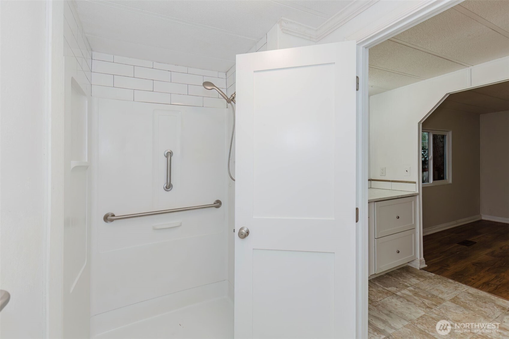 2535 70th Avenue Southwest, Unit 12 Tumwater, WA 98512 - Photo 18 of 33 a bathroom with a shower