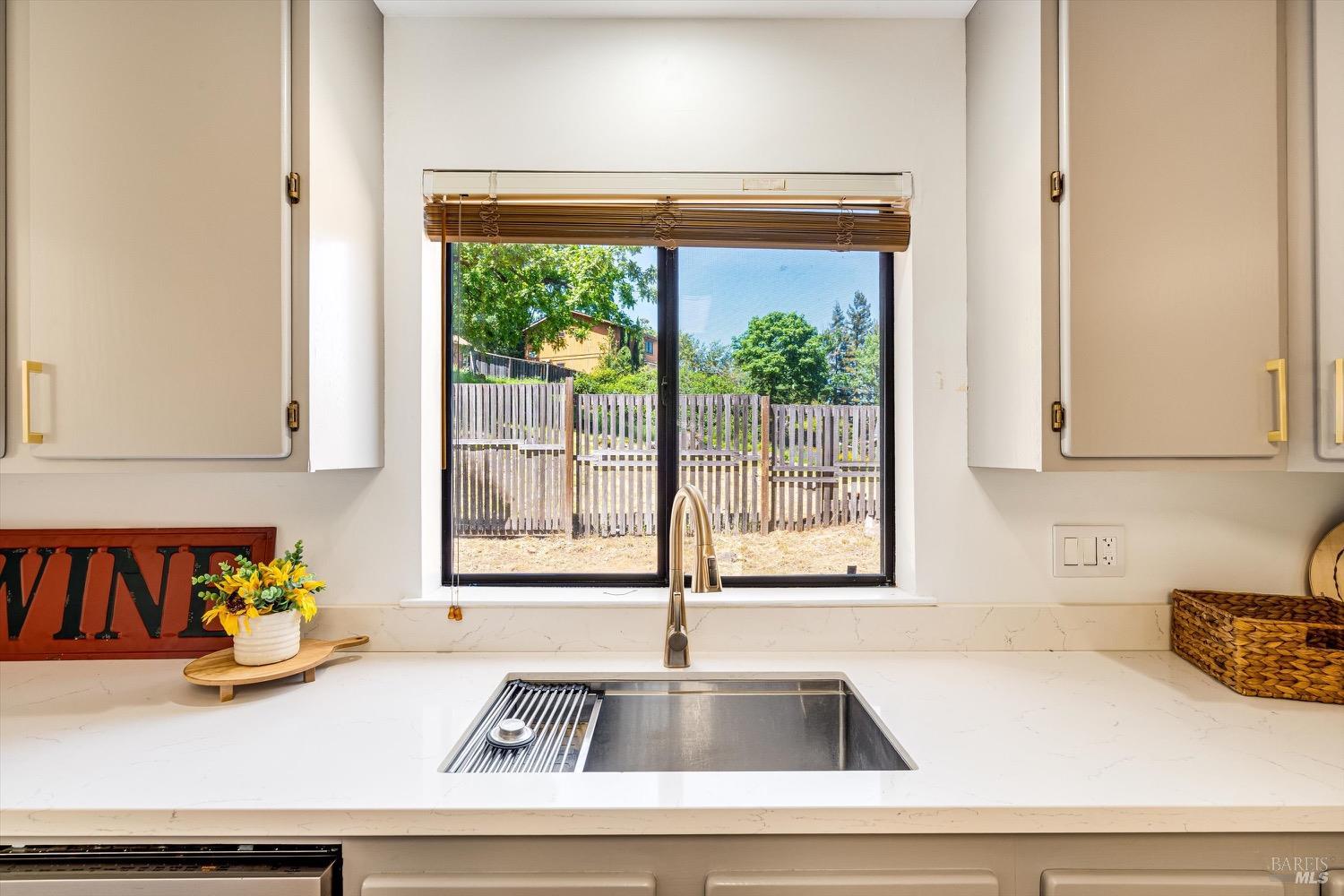 168 Ridgecrest Drive Napa, CA 94558 - Photo 15 of 39 a kitchen with a sink and a window