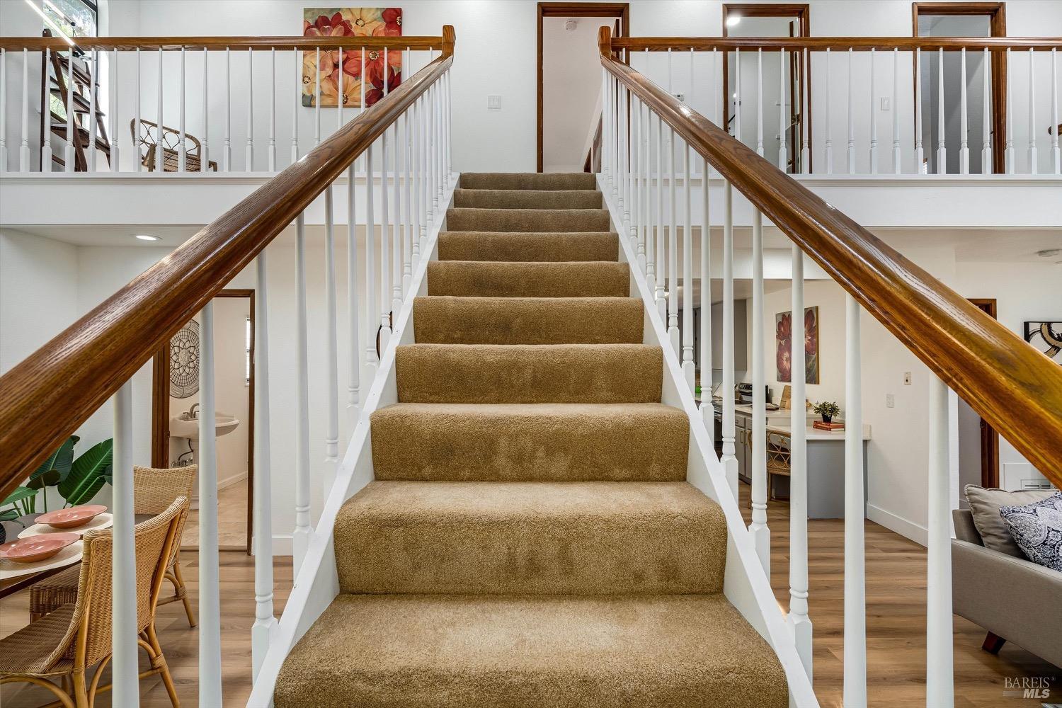 168 Ridgecrest Drive Napa, CA 94558 - Photo 21 of 39 a balcony with stairs and white walls