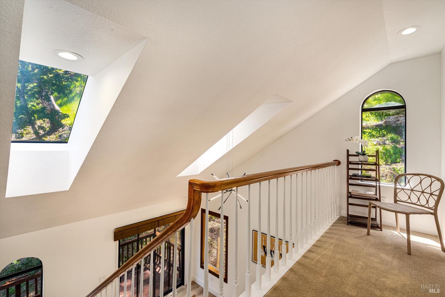 168 Ridgecrest Drive Napa, CA 94558 - Photo 26 of 39 a view of staircase with furniture and a window