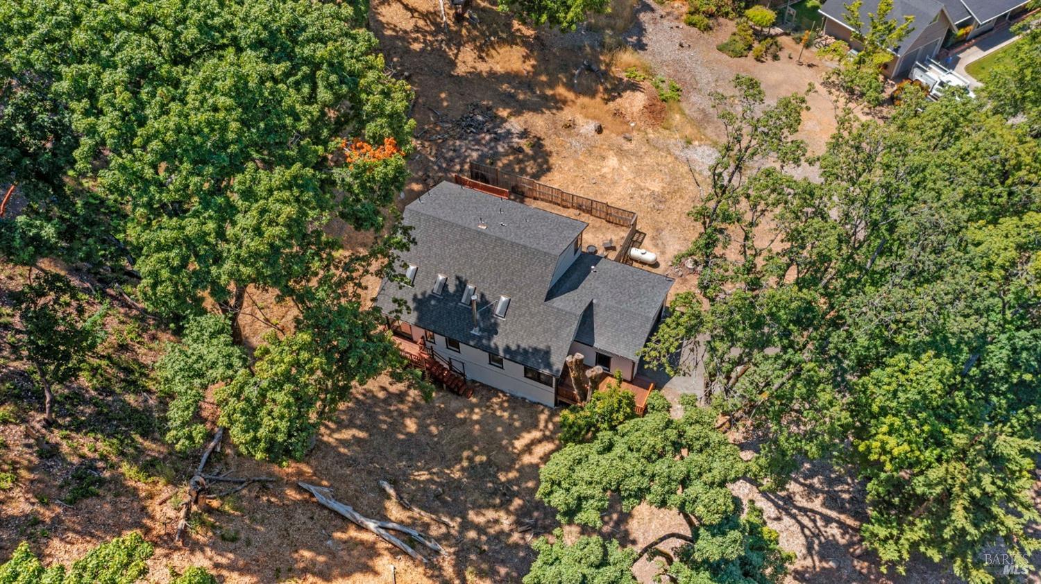 168 Ridgecrest Drive Napa, CA 94558 - Photo 36 of 39 an aerial view of a house with a yard and tree s